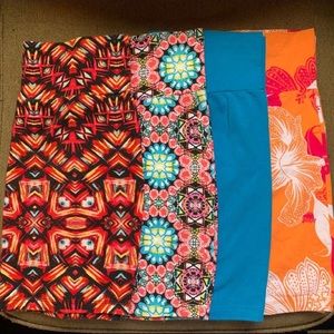 Set of 4 bodycon mini skirts. Large